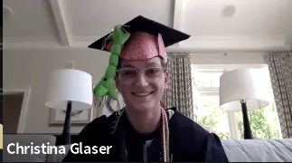 graduating senior wearing a brain-inspired costume cap and gown